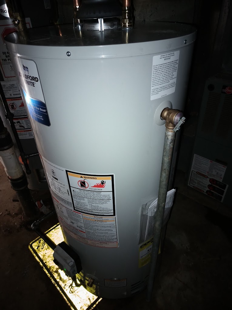 A water heater positioned in a room