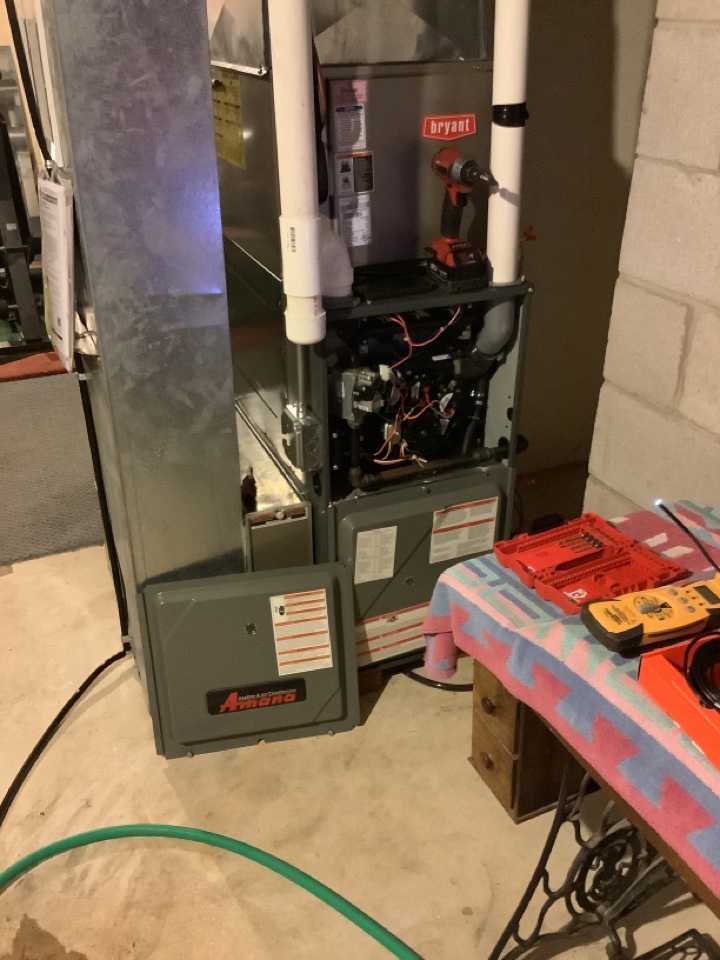 A residential furnace and water heater setup