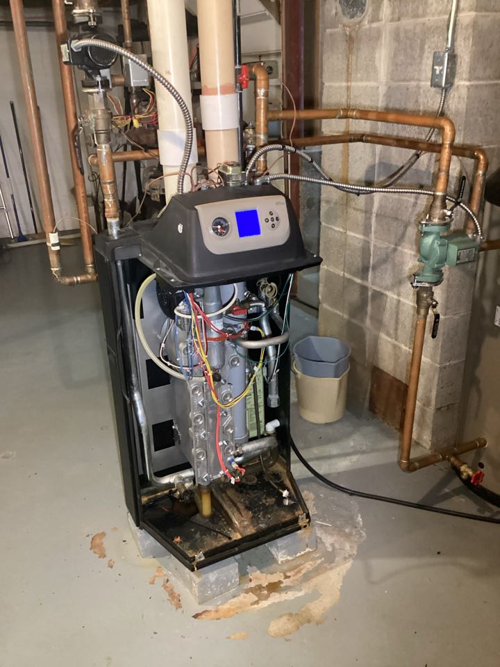 Interior view of a room featuring a gas furnace