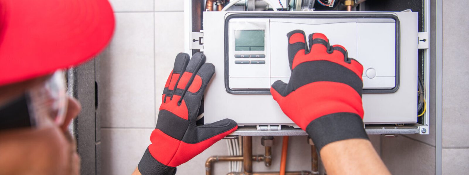 Technician inspecting the furnace systems